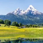Idyllic-summer-landscape-with-clear-mountain-lake-in-the-Alps